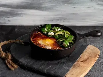 Rich Tomato Shakshuka with zucchini and feta