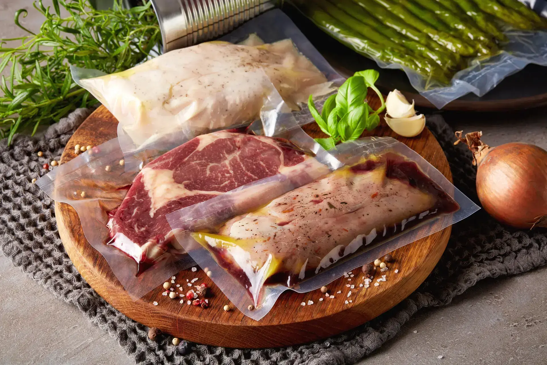Vacuum sealed meat and some vegetables