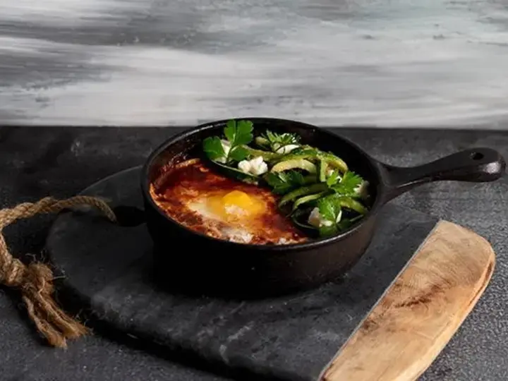 Rich Tomato Shakshuka with zucchini and feta