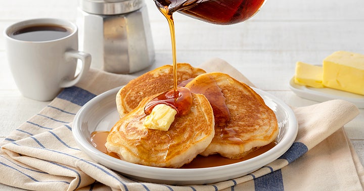 classic homemade pancake with syrup and butter