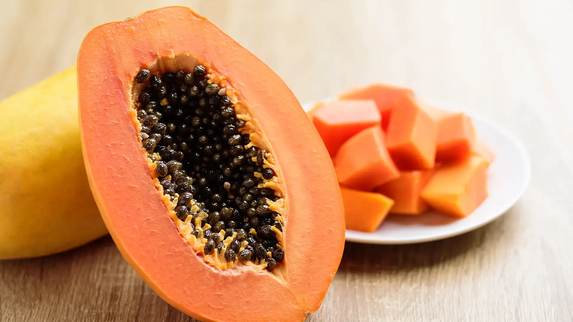 Half-and-sliced-papaya-fruit-ready-to-eating,-Tropical-fruit
