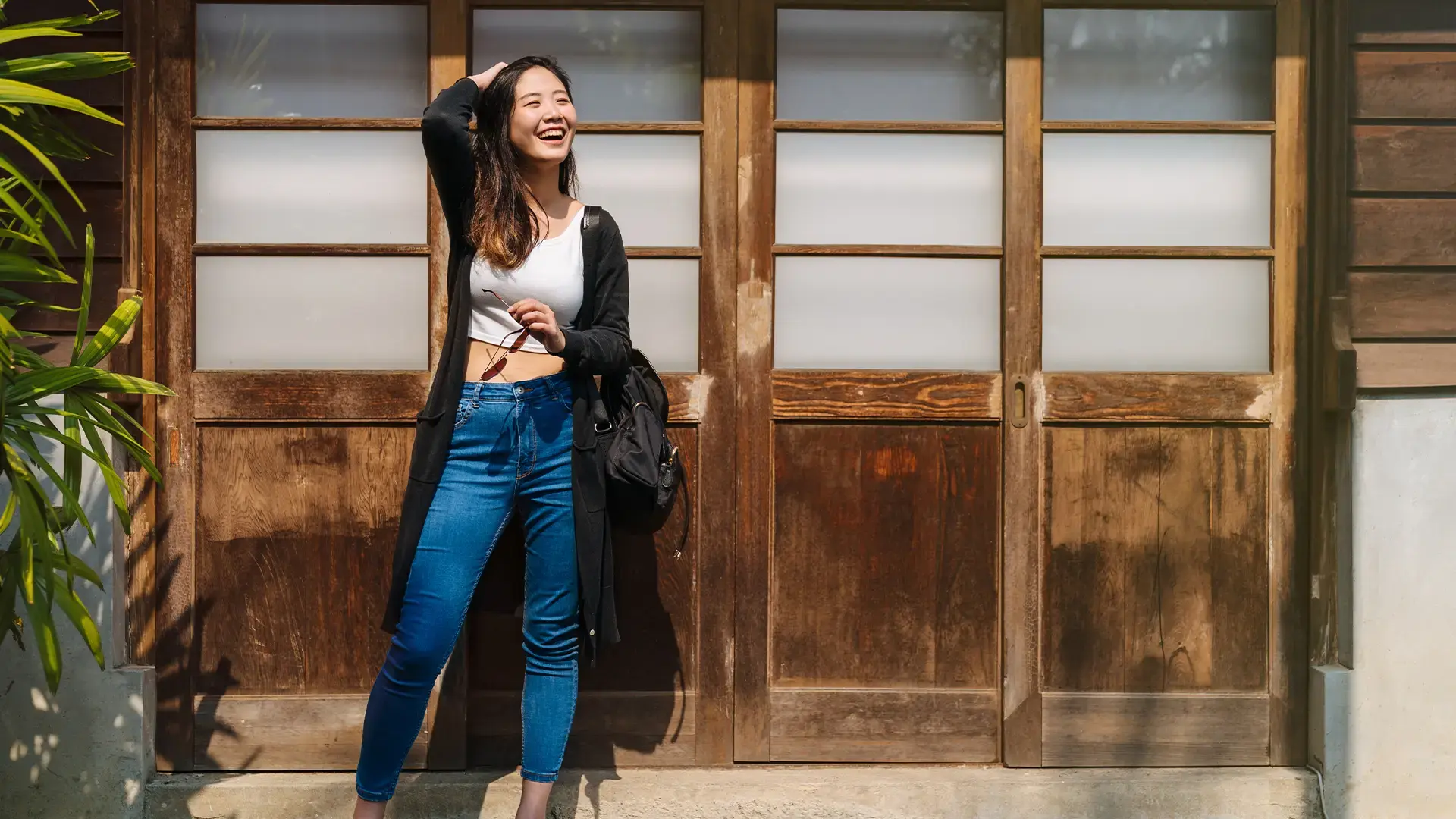 Happy-young-asian-korean-woman-traveler