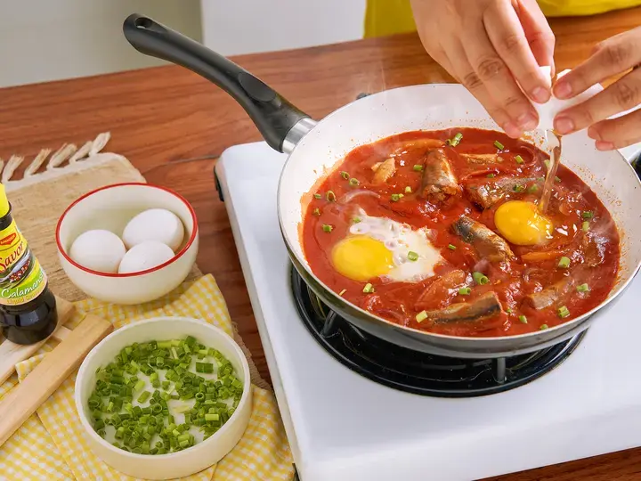 Cooking Ginisang Sardinas and Egg with MAGGI® Savor Calamansi